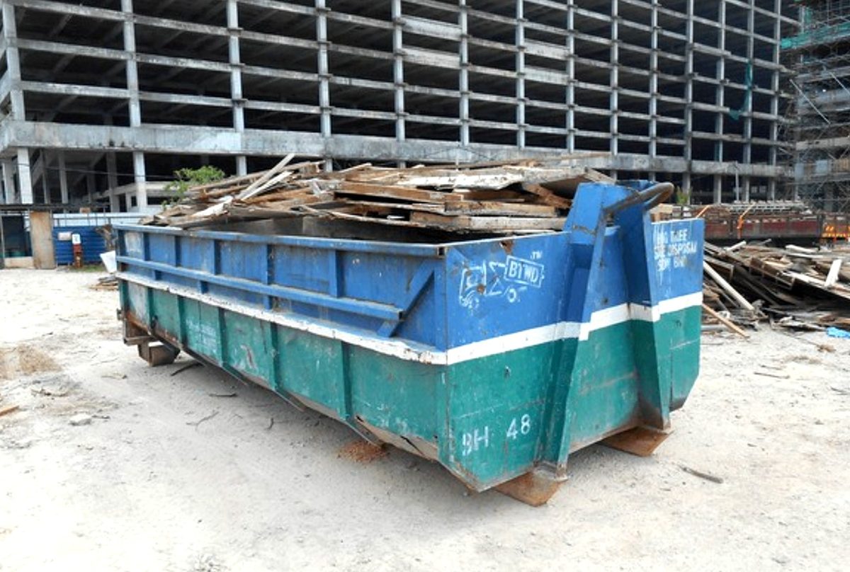 Real Roll-Off Dumpster Delivery in Residential Driveway